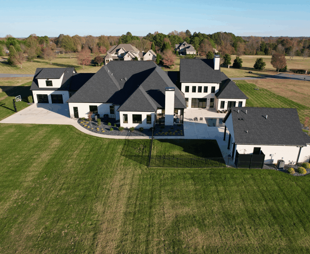 Aerial view of a modern farmhouse residential estate